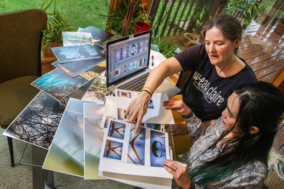 ABOVE: Jyl Kelley, left, and Wanrudee Buranakorn look over images for their upcoming exhibit. BELOW: “Premonition of Starry Night II,” by Buranakorn.