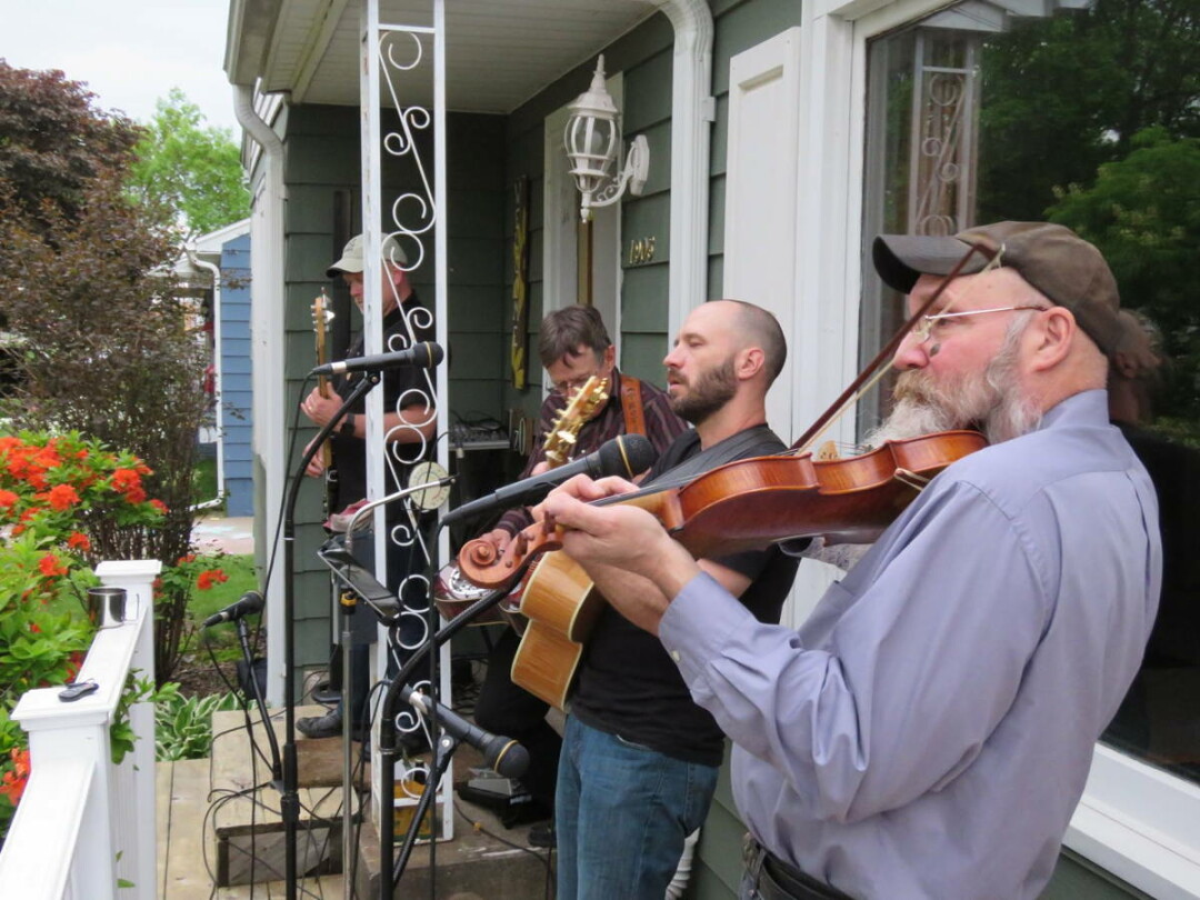 Bluegrass on Badger, a block party thrown in May on Eau Claire’s Eastside Hill, featured live bluegrass music (above), kids’ games, and a food truck (below).