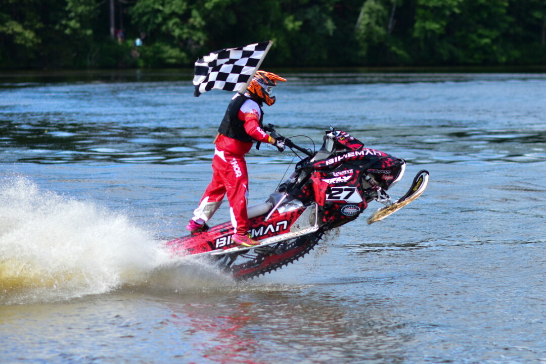 THE TRAILS ARE A LITTLE WET TODAY. Menomonie’s Wakanda Park Beach hosted the Lake Menomin WaterX June 24 and 25. The event saw drag races and oval races where competitors flew across the water on snowmobiles. Racers must go at least 30mph to stay afloat, but often reach 70 to 80mph.