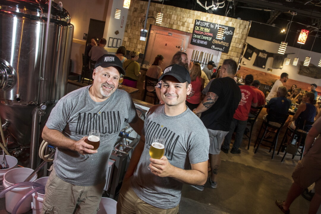 The Chippewa Valley’s newest craft brewery and taproom opened Friday, July 7. Modicum Brewing, headed up by Mike Blodgett and brewmaster Eric Rykal (above), is nestled into the west side of Altoona (3732 Spooner Ave. Suite A).