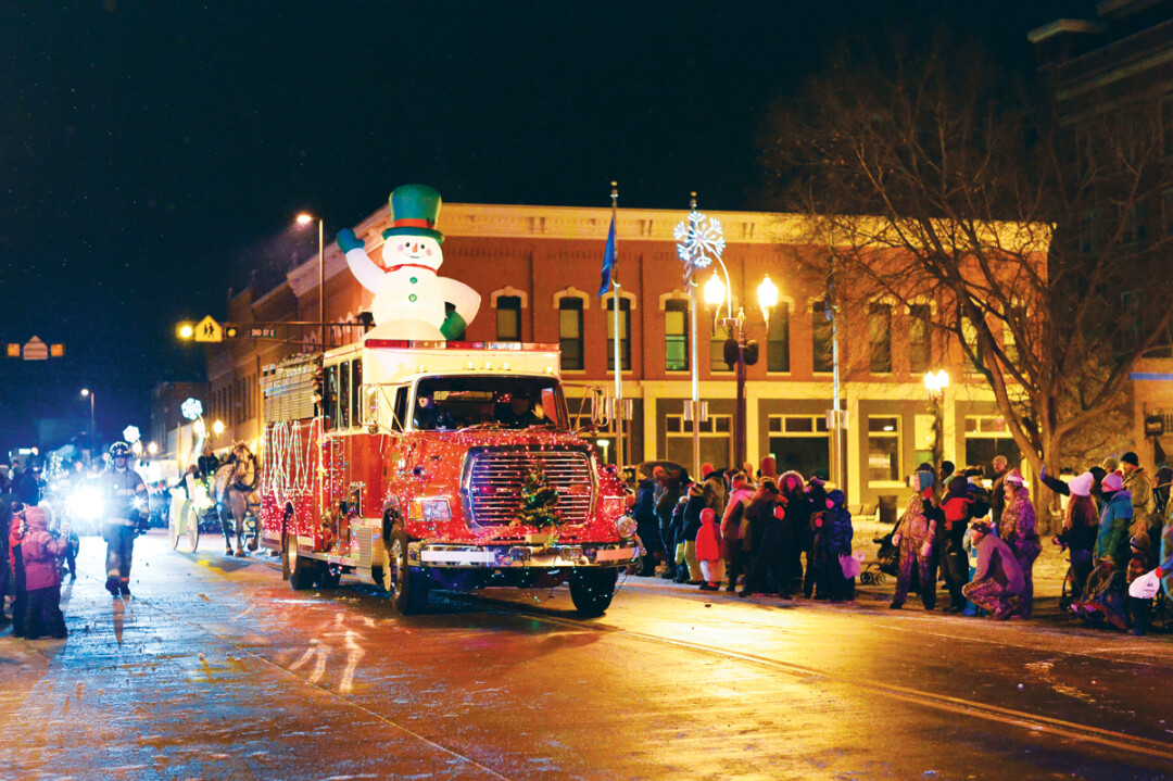 SNOWBODY GETS IN OUR WAY. The 14th Annual WinterDaze Parade paraded through historic downtown Menomonie on the night of December 14, culminating in a winter fireworks show over Lake Menomin.