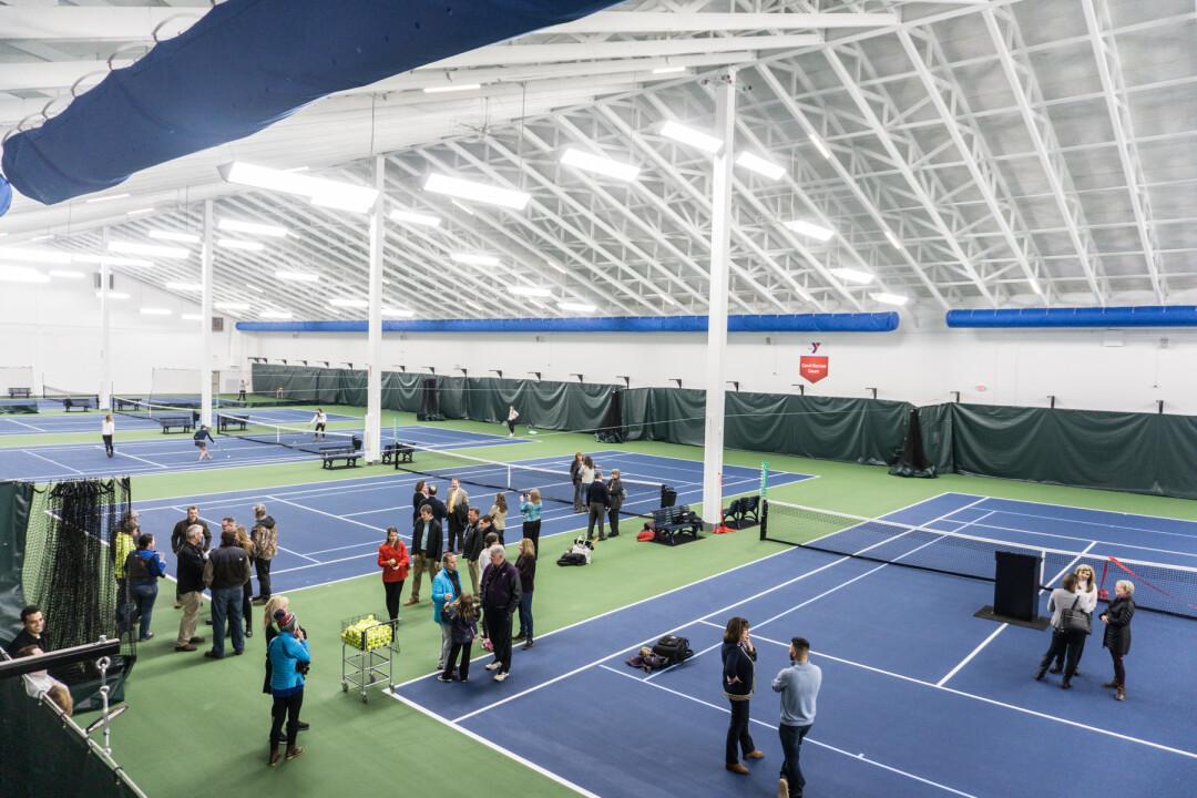 TENNIS, ANYONE? The new John & Fay Menard YMCA Tennis Center features eight indoor courts, state-of-the-art technology, and a viewing mezzanine. The facility's ribbon cutting was April 4.
