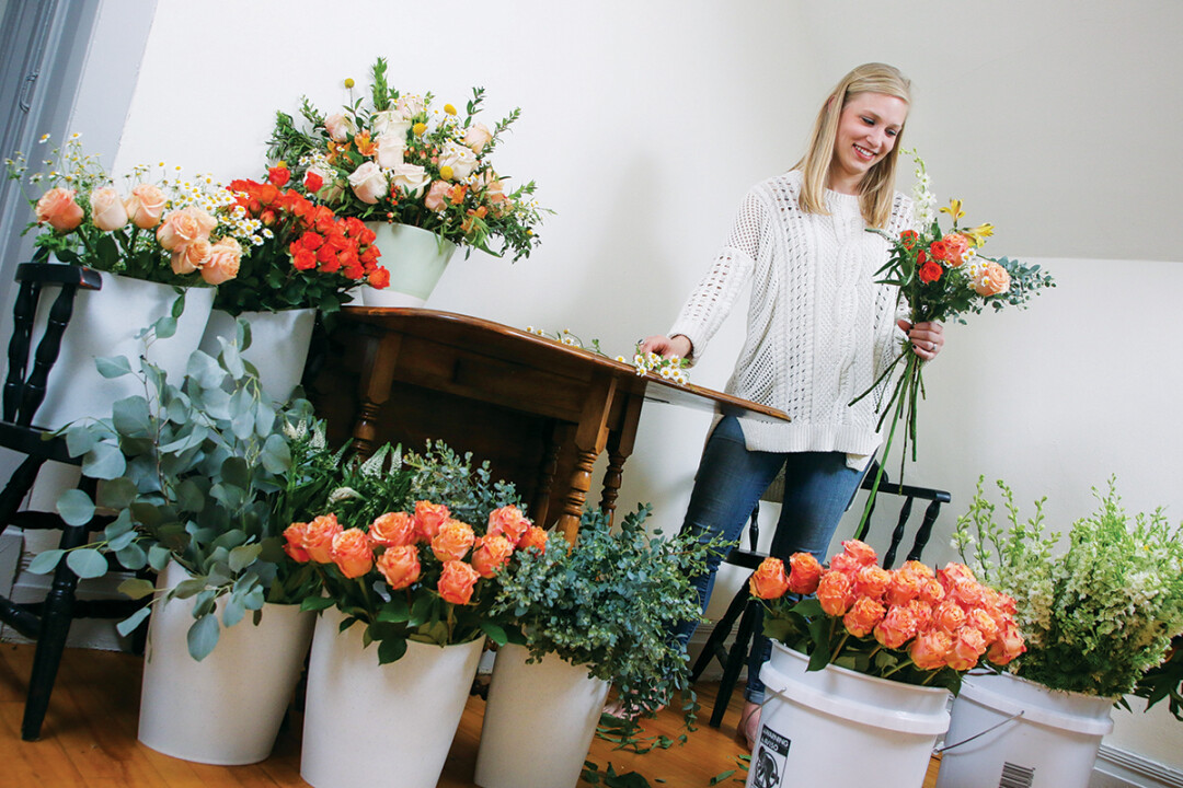A BLOOM WITH A VIEW.  Mikelle Larson of Fersk Floral Artistry considers color, shape, and texture as she pulls together her flowery creations. She says she’s inspired by both nature and modern design.
