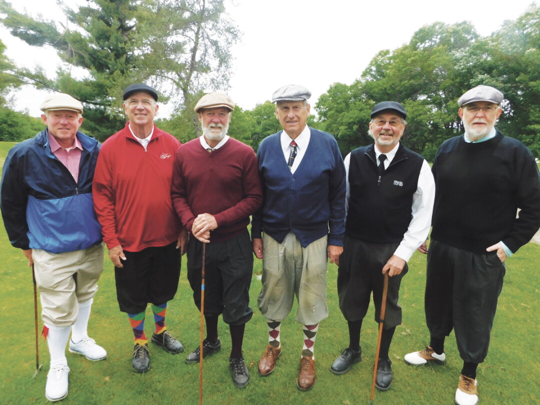 DRESSED FOR FAIRWAY SUCCESS. A group of hickory golf club enthusiasts gathered June 2 at Lake Hallie Golf Course for the second annual Lake Hallie Hickory Classic. The golfers, including David Morley, right, wore period clothing and used authentic hickory golf clubs, some of which are more than a century old.