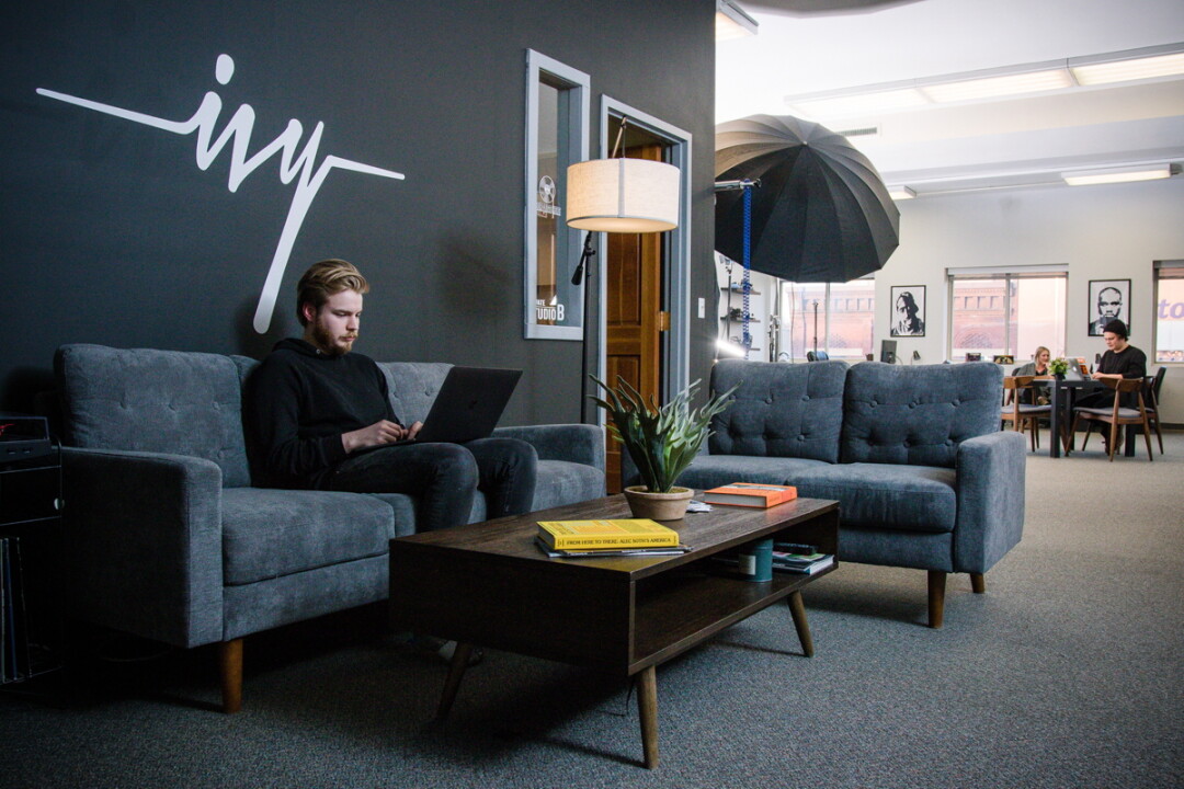 COUCHED IN CREATIVITY. Alak Phillips is one of the co-founders of Ivy Creatives, a new downtown Eau Claire co-working space.