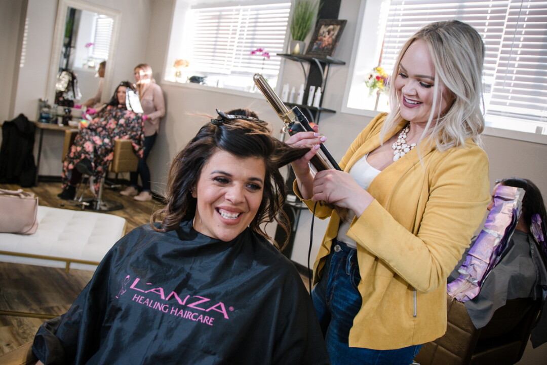 THEY’RE NOT JUST TEASING. Cassy Jablonsky, right, is one of the owners of Hair Reborn, a new downtown Eau Claire salon, 405 S. Farwell St.
