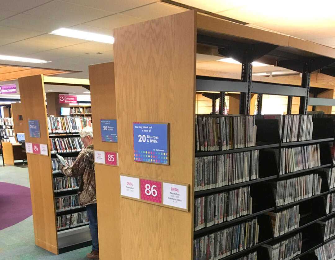 CHECK ’EM OUT. The relocated DVD shelves on the first floor of the L.E. Phillips Memorial Public Library.