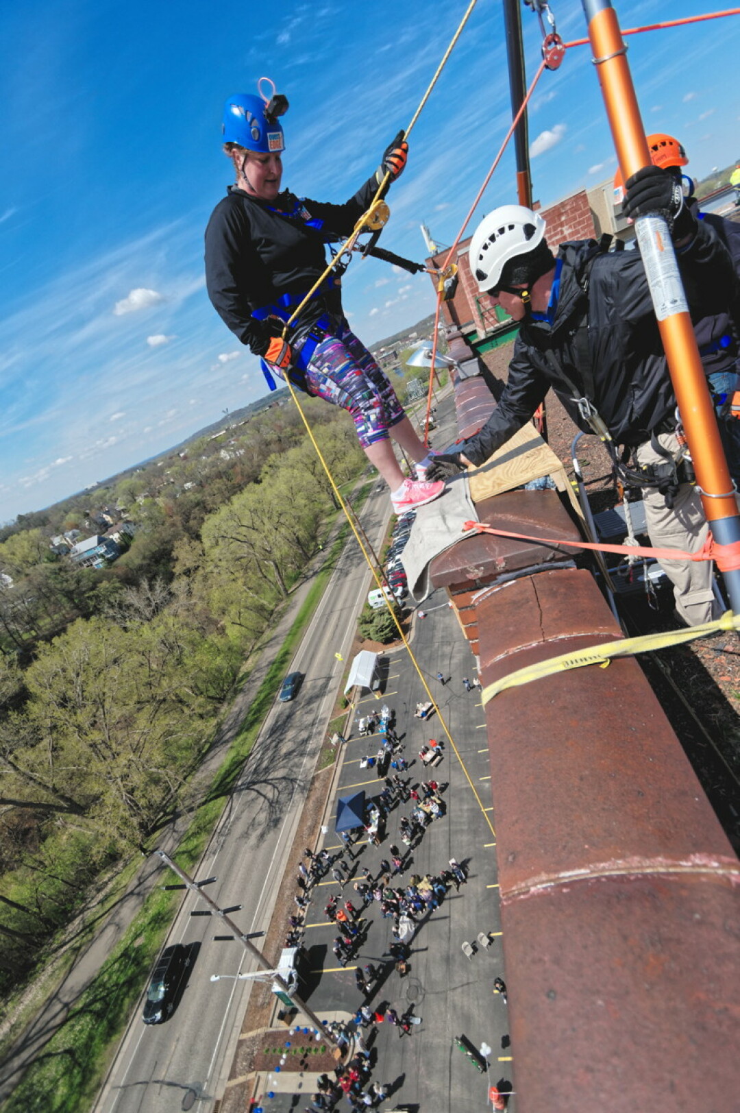 ONE OF THE EDGIEST PHOTOS VOLUME ONE HAS EVER PUBLISHED. On Saturday, May 11, locals rappelled down the side of Banbury Place on Galloway Street near downtown Eau Claire to help raise money for the Children’s Dyslexia Center. See more photos at VolumeOne.org