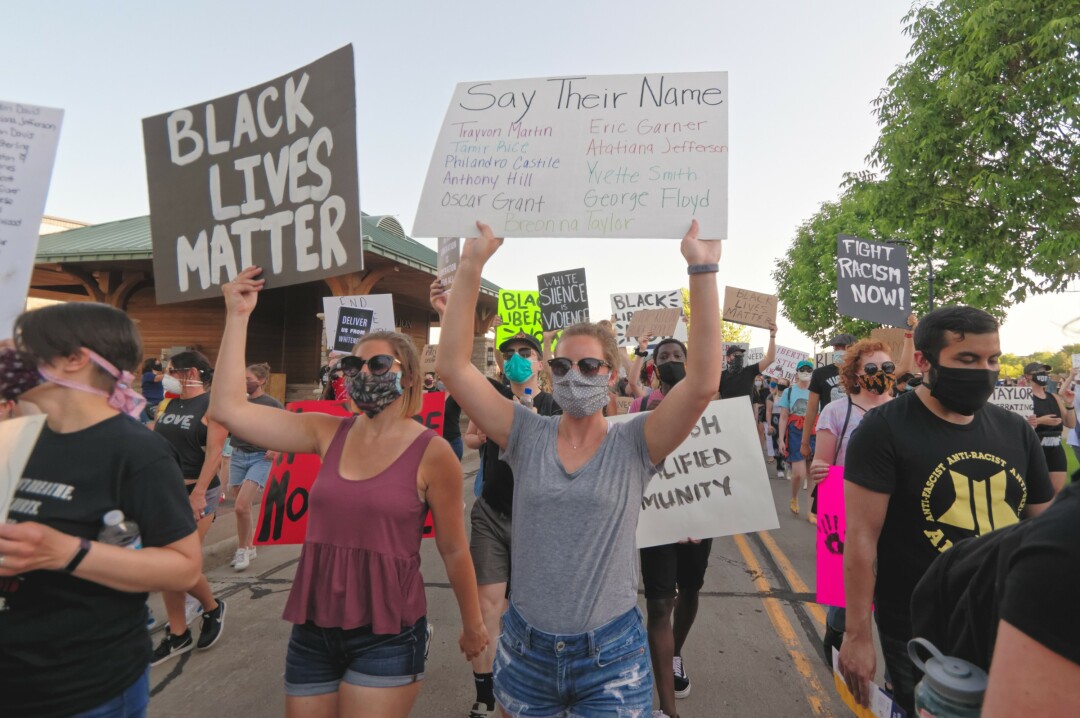 Participants in a Black Lives Matter rally and march on Friday, June 4, in Eau Claire.