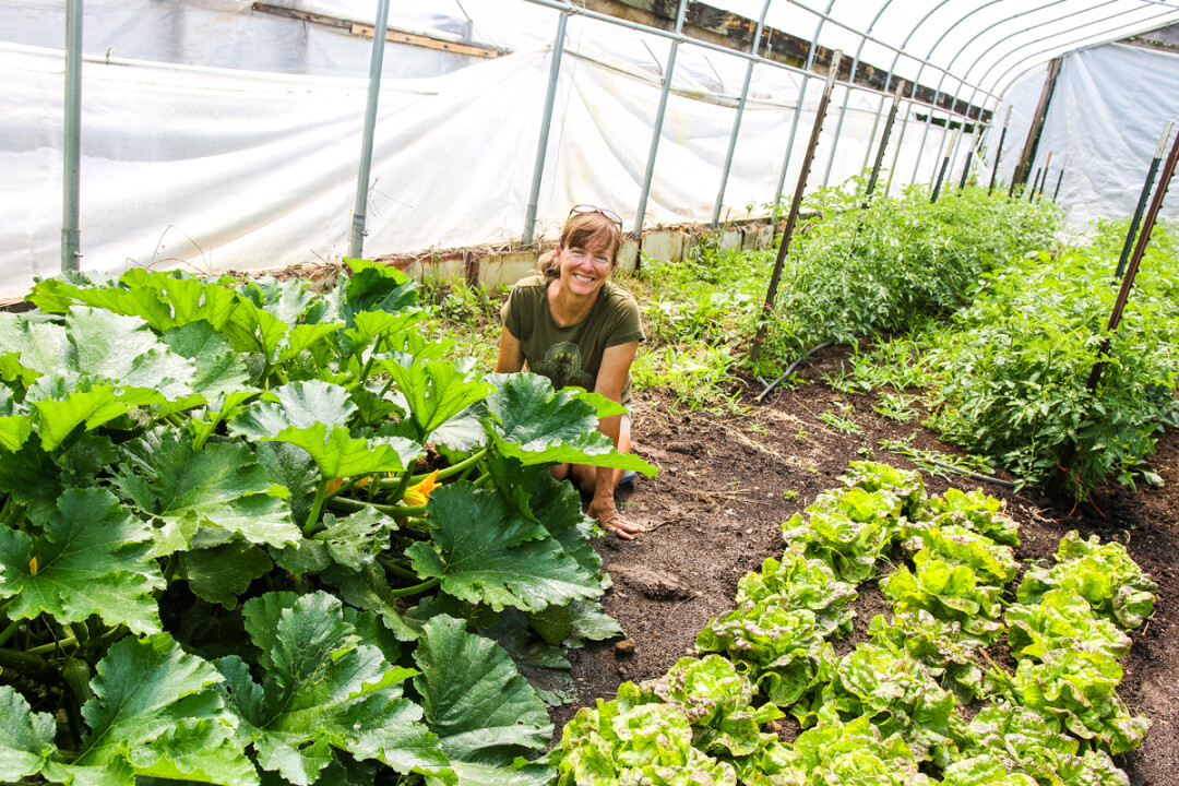 STAY GREEN. Kristina Beuning, owner of Sunbow Farm outside Eau Claire, farms organically and sustainably. 