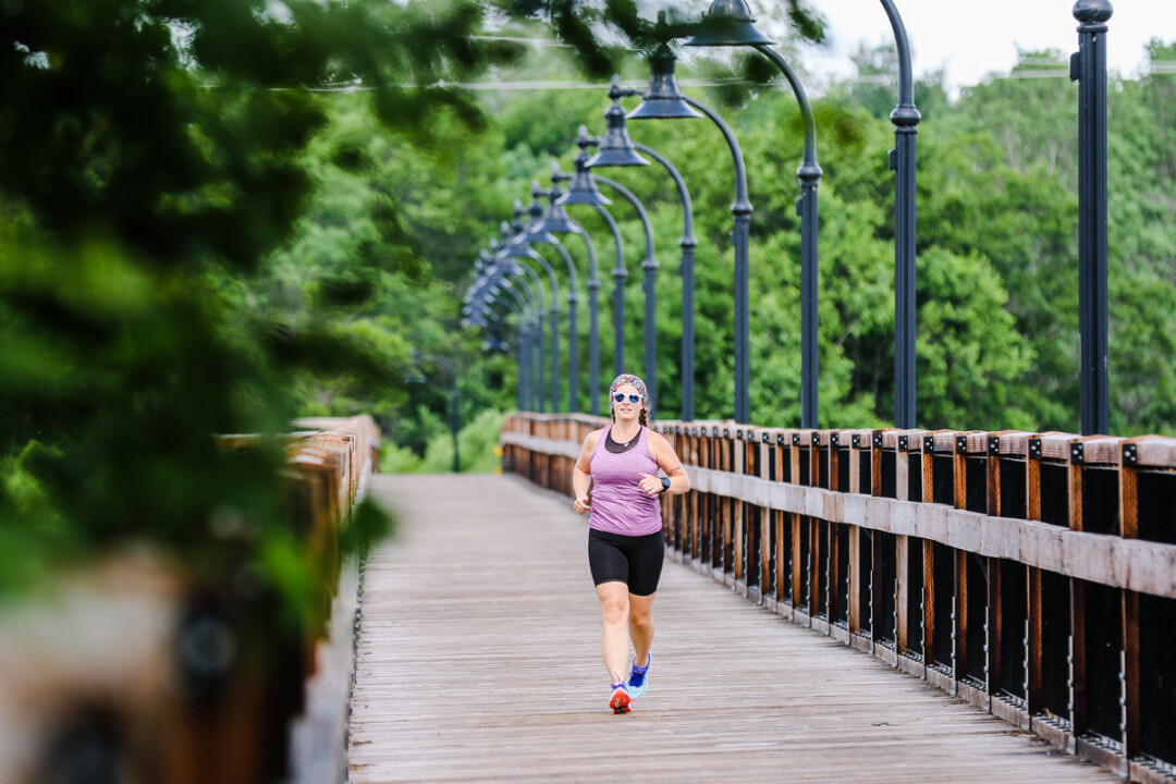 Mackenzie Deffenbaugh, a local mom and full-time employee with Eau Claire County, is out running as early as 4am to train for a race she is committed to completing – even though it was cancelled due to COVID-19.