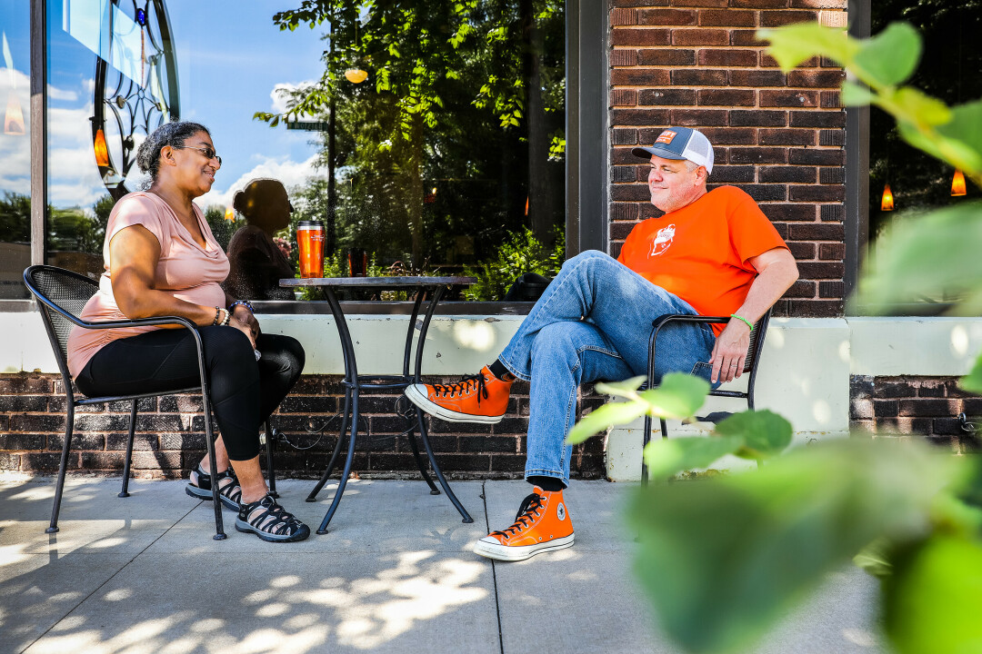 CONVERSATIONS IN COLOR. Dr. Selika Ducksworth-Lawton and Ed Hudgins often met at Acoustic Café when working on their new weeky radio series, 