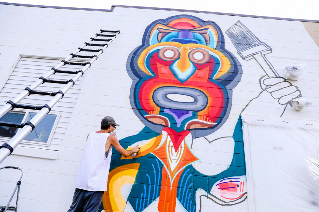 EMPOWERMENT THROUGH ART. Jaden Flores integrates his Mexican heritage and interest in Mayan design into his mural, which is on the 600 block of Barstow Street in Eau Claire.