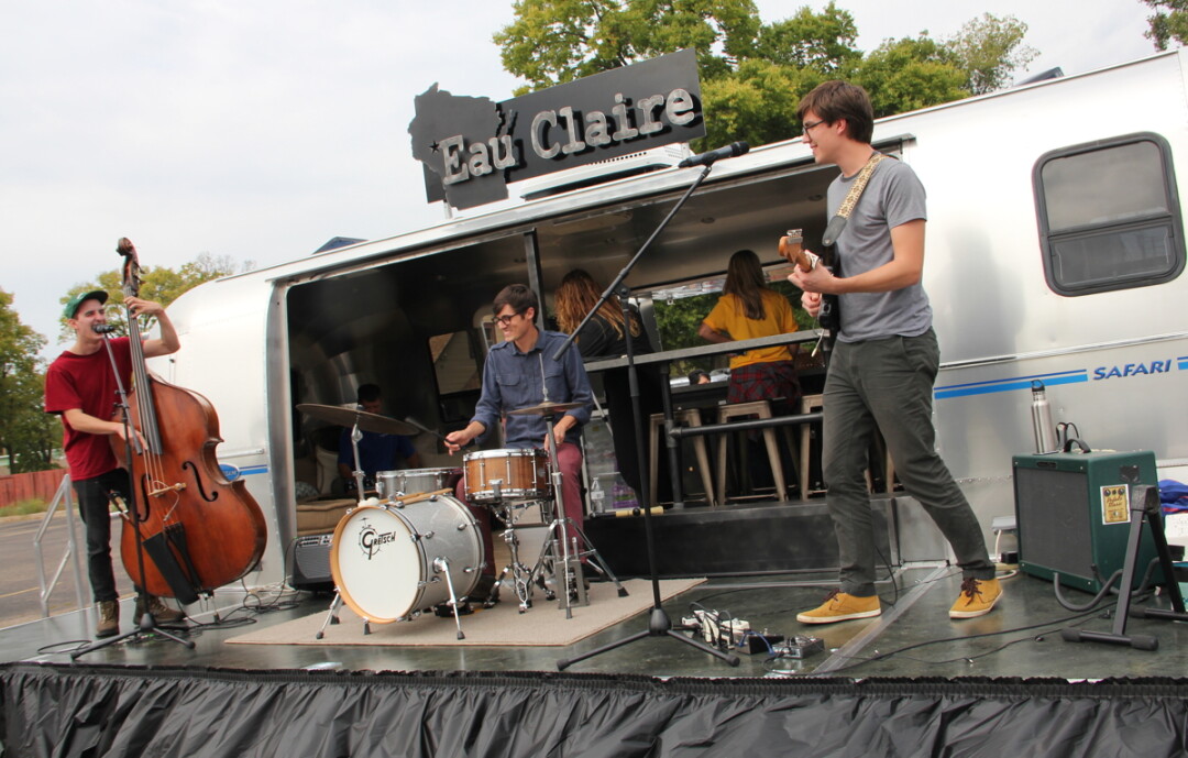 Rockin' on the fold-out stage of Visit Eau Claire's Eau Claire-Stream trailer during pre-COVID times.