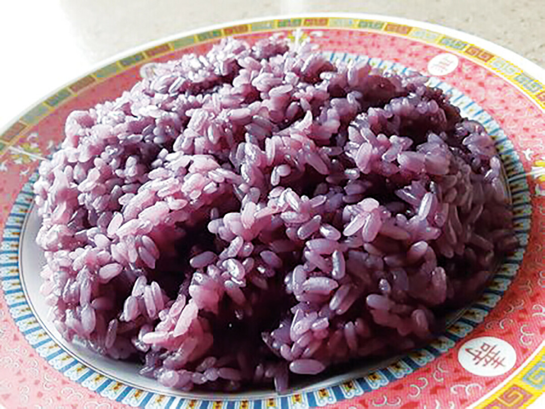 Purple sticky rice is more than just a colorful, flavorful food. It's a way to celebrate Hmong heritage and culture. 