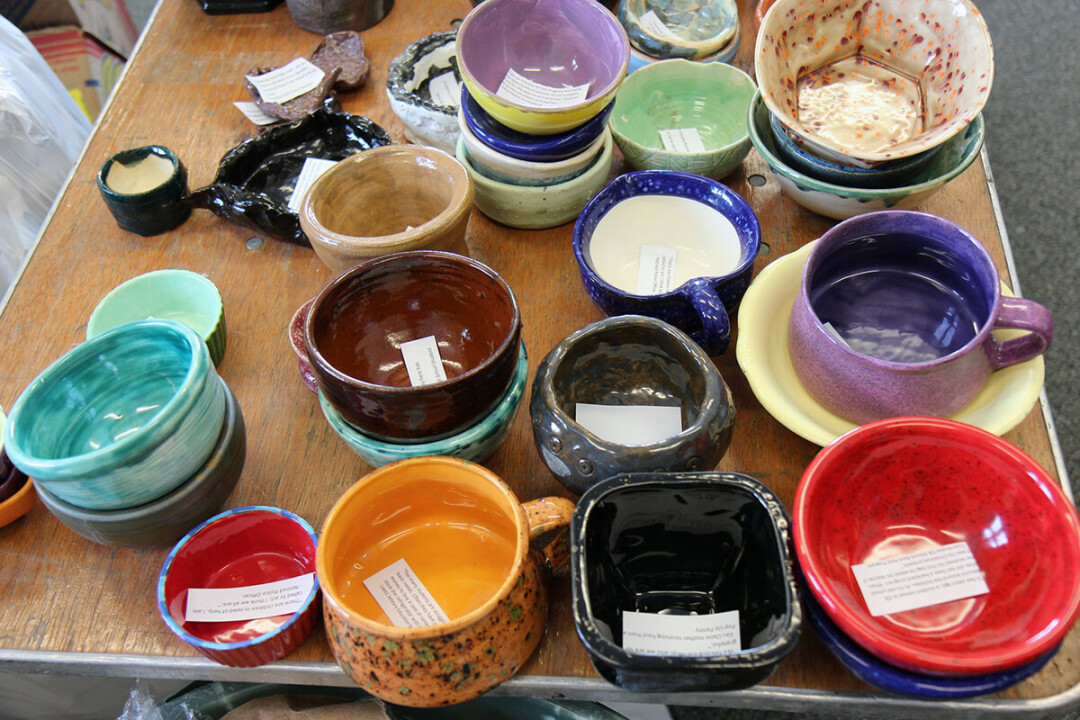 Hand-made bowls on display at last year's Empty Bowls fundraiser. (Photo via Facebook)