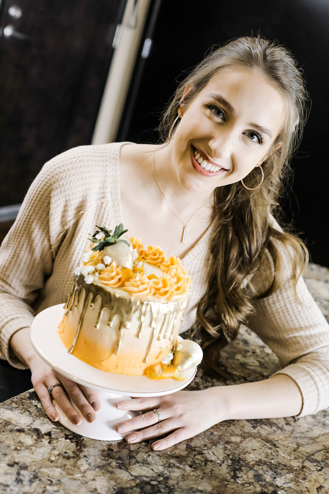 UW-Eau Claire student Michayla Thielen creates amazing baked goods like this orange dreamsicle cake. 