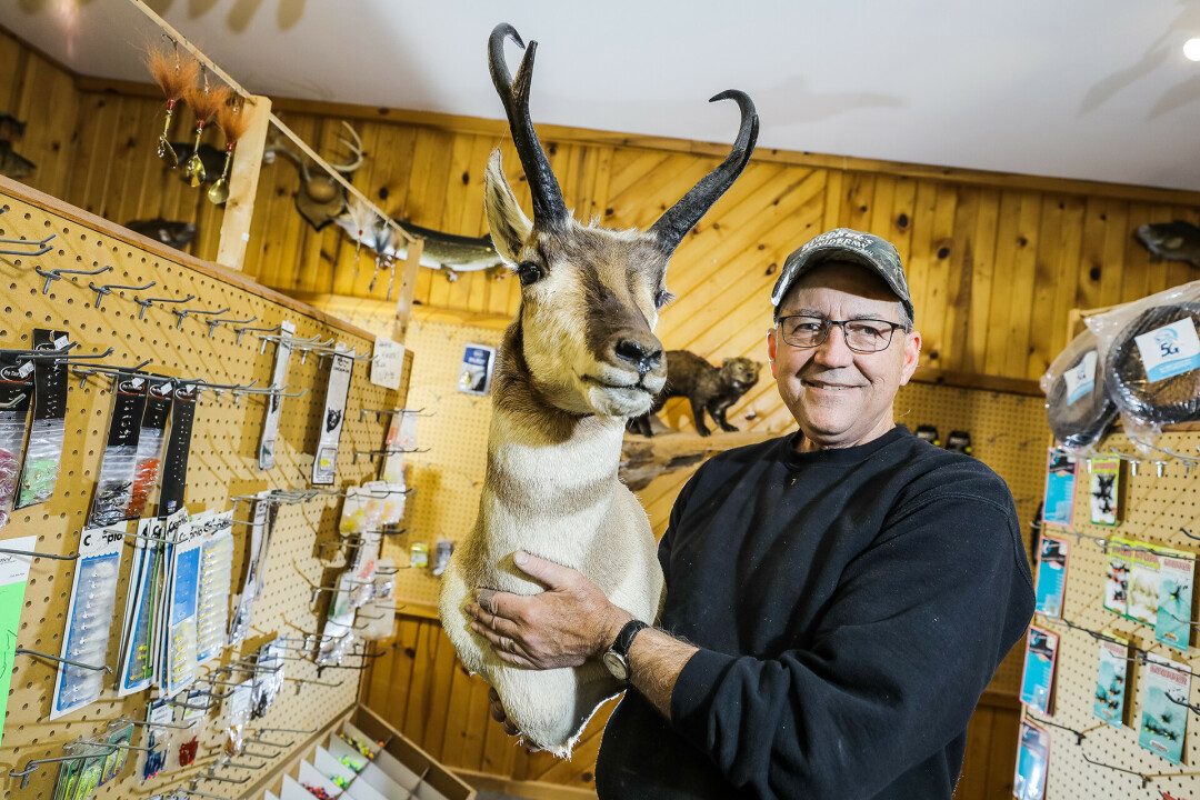 SCALING BACK. After 44 years in the hunting and fishing business, Mike Buroker of Buroker’s Taxidermy, Bait, and Tackle looks forward to a tranquil retirement, working at his own pace.