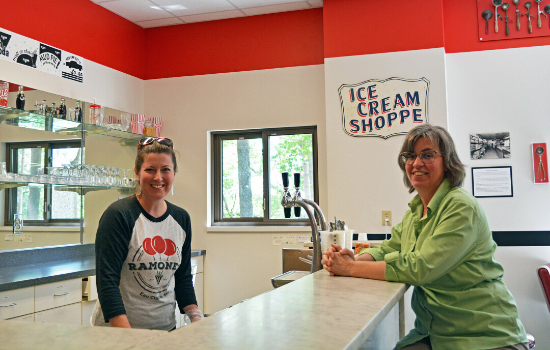 A SWEET NEW COLLABORATION. Kayla Midthun (left), owner of Ramone's Ice Cream Parlor, and Carrie Ronnander (right), director of Chippewa Valley Museum, have partnered to begin offering Ramone's Ice Cream Parlor's The Chocolate Shoppe Ice Cream at the museum beginning this summer. (Photo by Rebecca Mennecke)