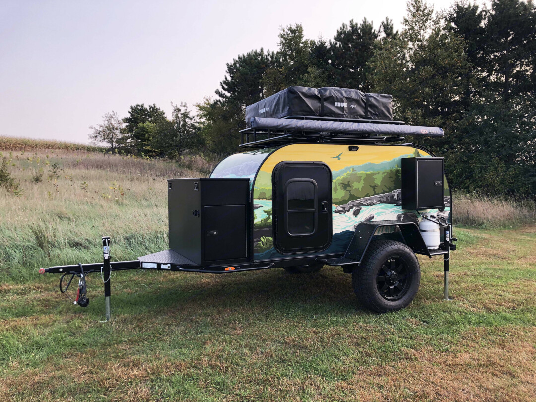 LOOKING FOR A GOOD GETAWAY? You're looking right at it. This little camper can comfortably sleep five individuals with air conditioning and heating inside.