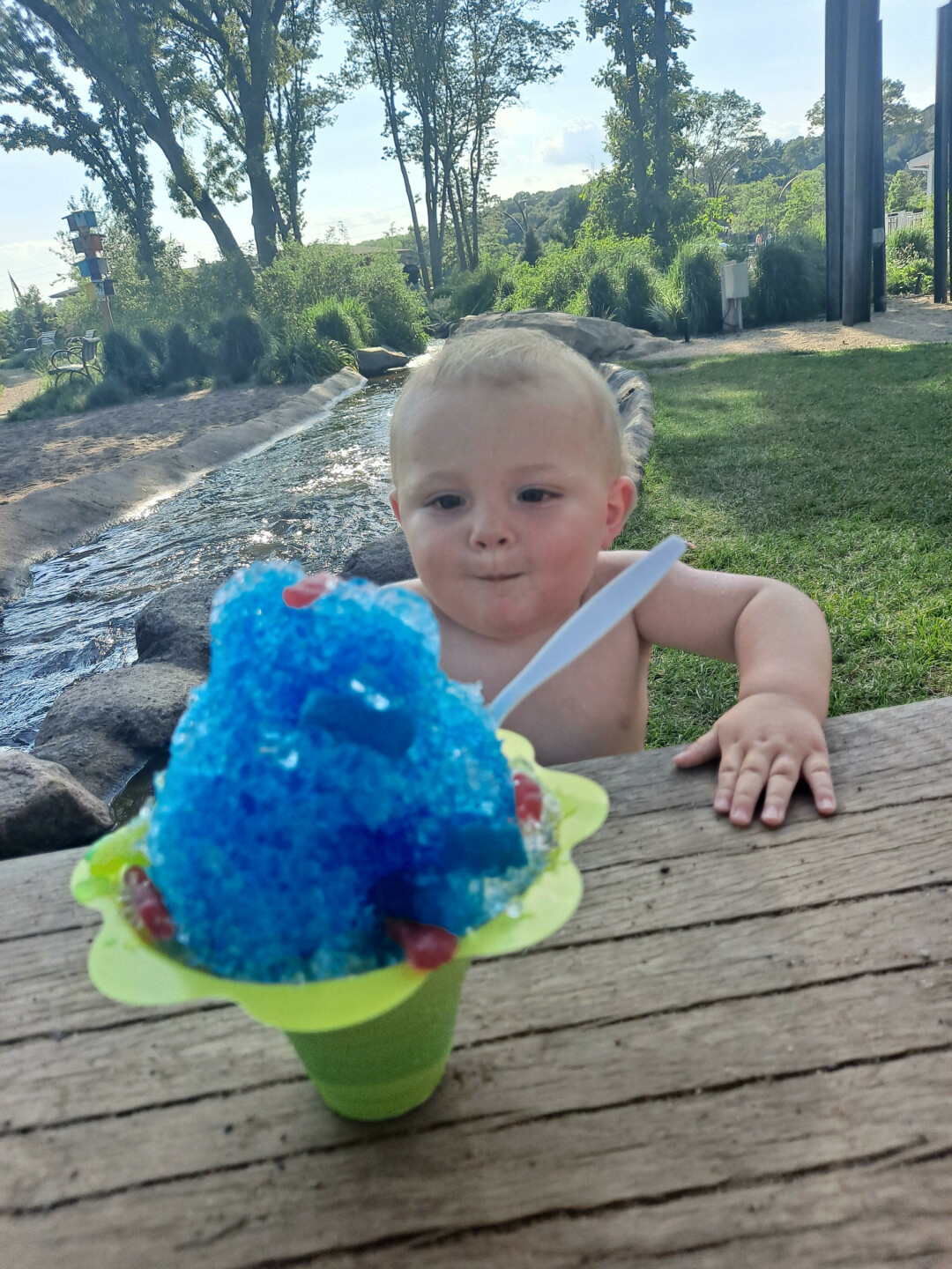 CONCENTRATE ON WHAT'S IMPORTANT: snow cones. This adorable baby 