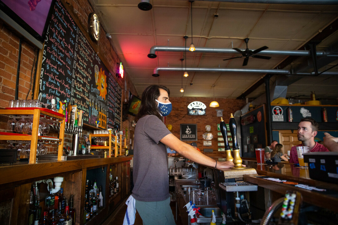 TAPPING IN. The Fire House, a downtown Eau Claire tavern owned by Pablo Group, recently re-opened after being closed throughout the pandemic. The pub is known for having a huge number of rotating craft beers on tap.