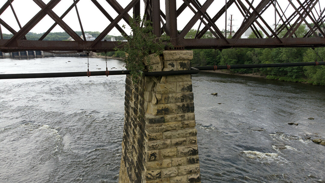 This photo, taken with a drone by Bryan Pederson, shows damage to one of the stone piers holding up the High Bridge over the Chippewa River. (Click for a bigger view.)