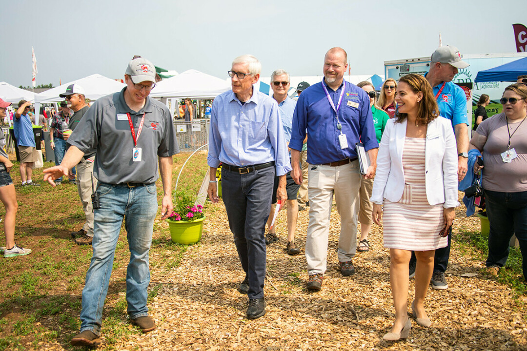 Farm tech days: Sunem Beaton-Garcia, president of Chippewa Valley Technical College, walks with Governor Tony Evers during Farm Technology Days in July. 