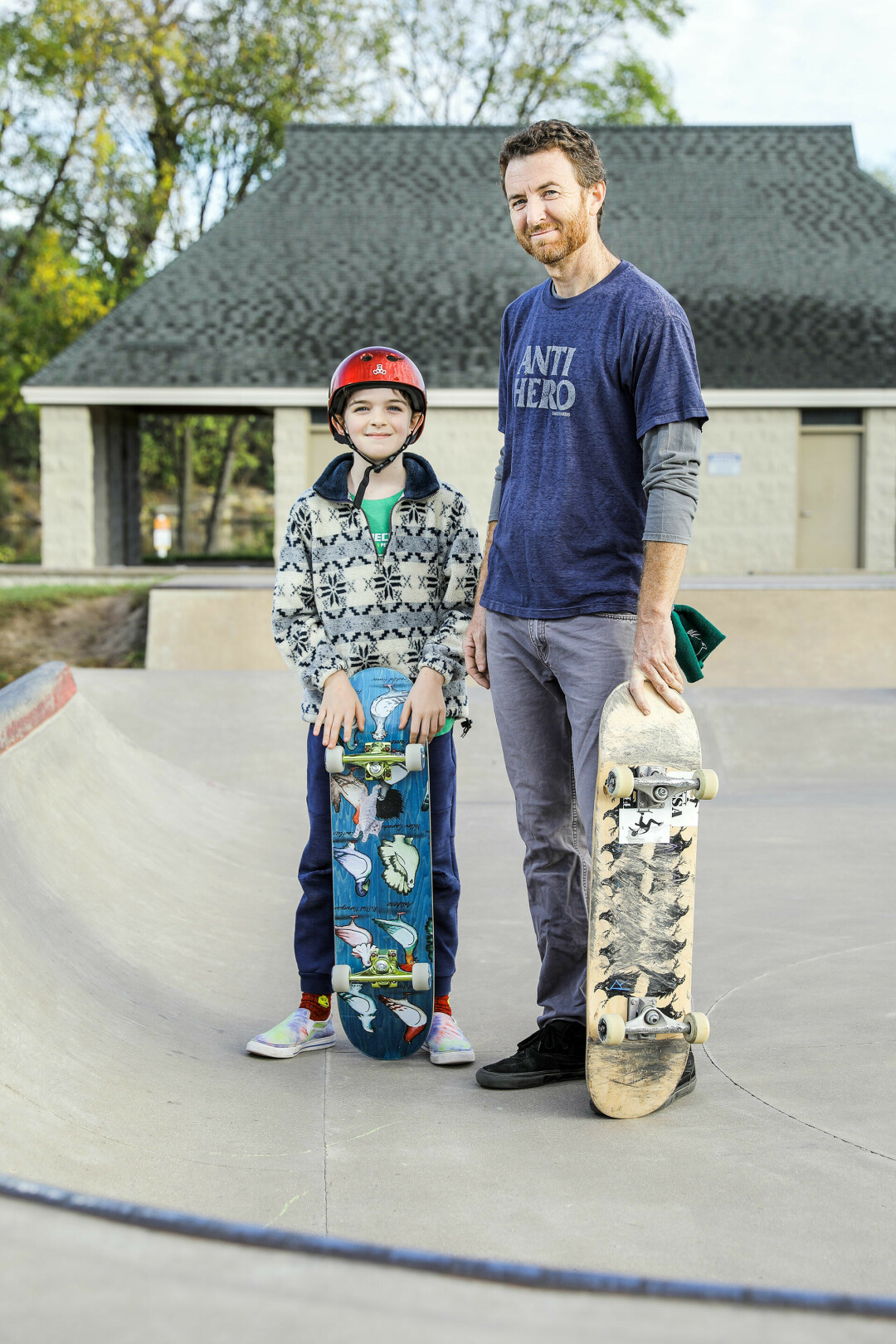 Gabe Brummett and his son, Burley, who both enjoy using Eau Claire’s skate park in their spare time. (Photo by Andrea Paulseth)