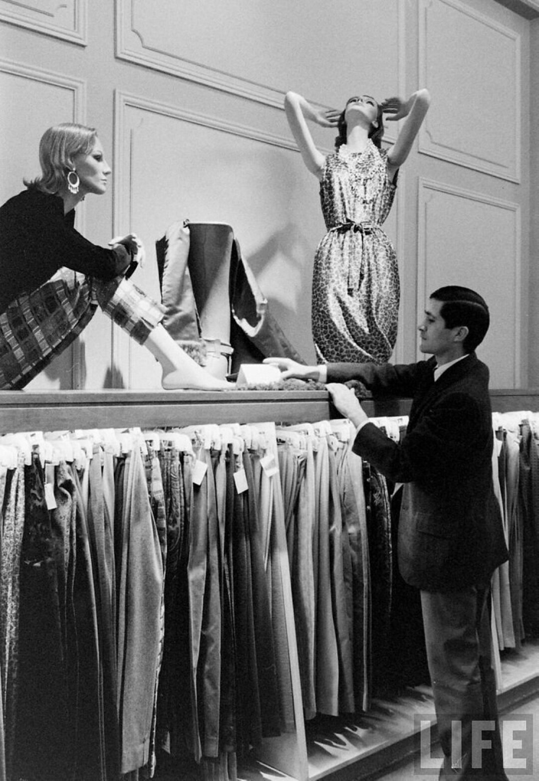 A photo from Time Magazine of the 1960s visual merchandising department of Saks Fifth Avenue in New York City. 