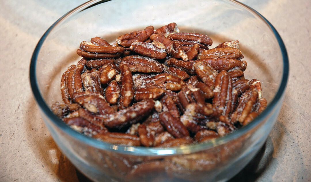 A TOP-SECRET FAMILY RECIPE. V1 contributor Kalyn Cronk's family has made these spiced pecans for as long as she can remember, and they've always been a hit. This holiday season, try making them for yourself! (Photo via Getty Images)
