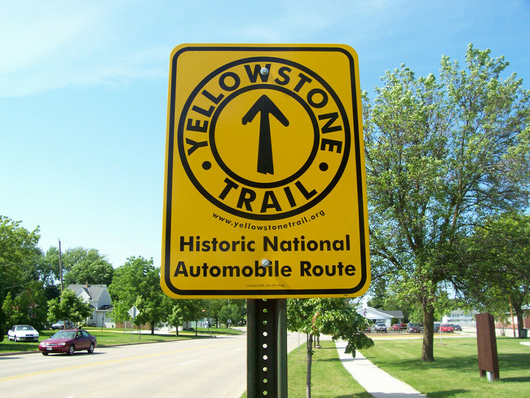 THIS WAY TO ADVENTURE. Signs like these throughout Wisconsin trace the old Yellowstone Trail route through the state, including in Eau Claire. (Photo via Creative Commons)