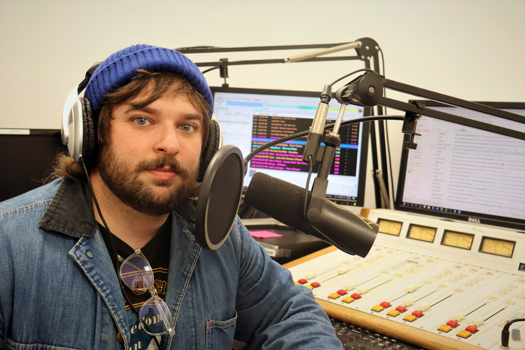 ON THE AIRWAVES: Jordan Duroe, host of 'Farewell Transmission' on Converge Radio lends his expertise on the genre to his new program. Photo by Parker Reed.