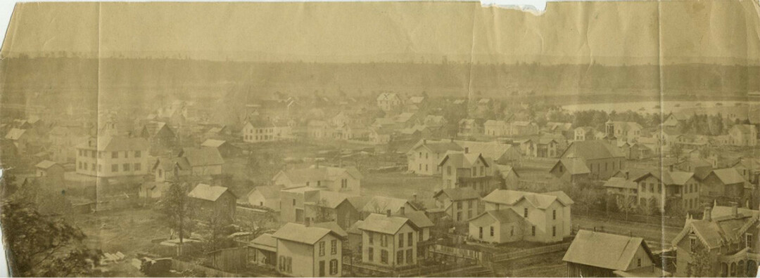 OLD TIME EAU CLAIRE. The view of Eau Claire's east side in 1868. (Chippewa Valley Museum photo)