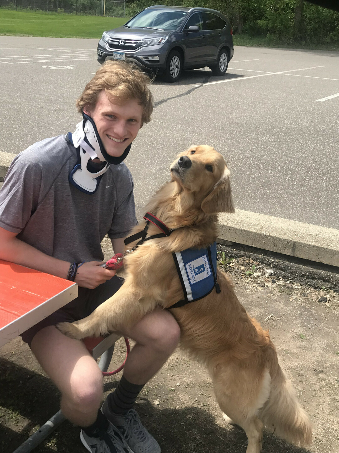 Zach Caterer and his dog Koda (pictured) try to give back as much as possibel