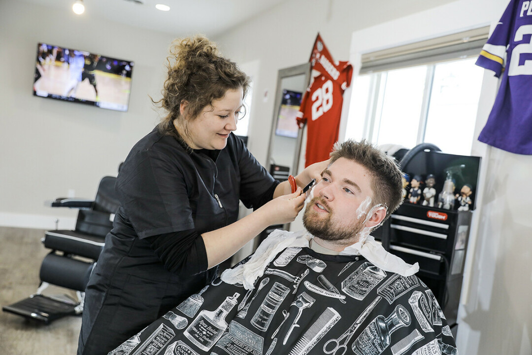 SHAVE AND A HAIRCUT ... The owners of Just The Tip, a new barbershop in Eau Claire, say they want to create a fun, relaxed atmosphere.