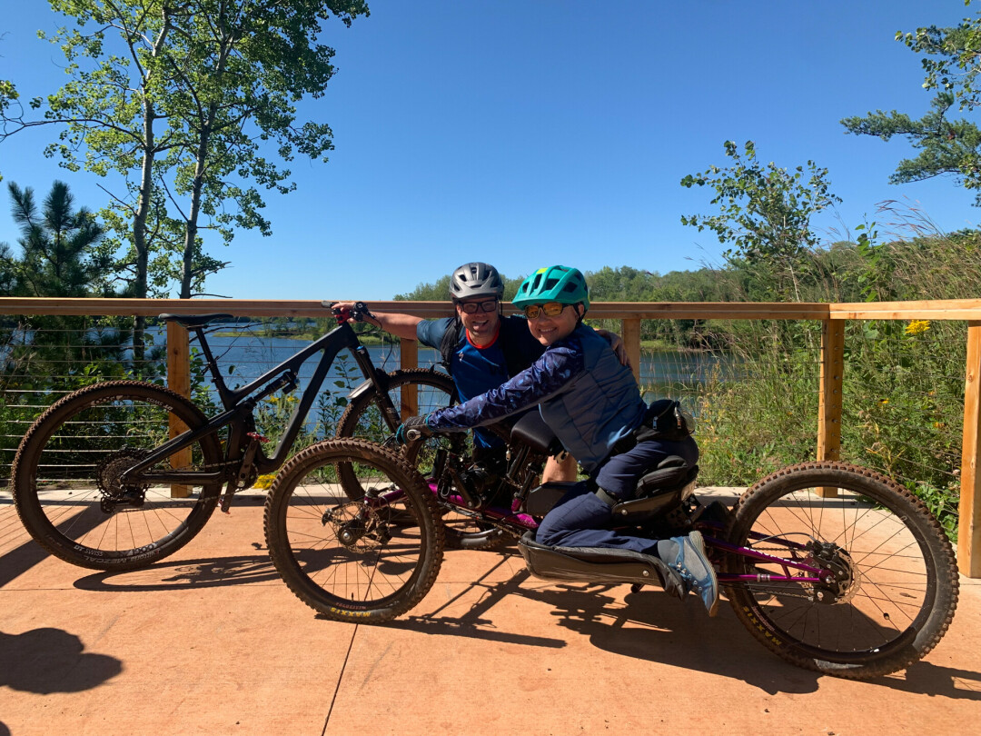 Lacey and her husband at the first purpose-built adaptive mountain bike trails, Cuyuna.
