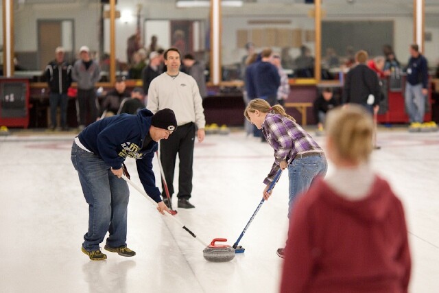 HOT ACTION ON THE ICE. The Eau Claire Curling Club hosts league play as well as "Learn to Curl" events for newbies. (File photo)