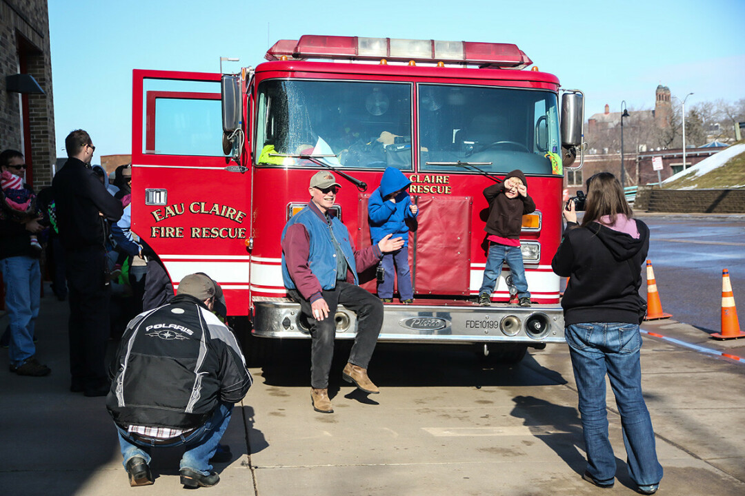FUTURE FIREFIGHTERS? Families tour Eau Claire Fire Station No. 2 during a 2016 event. (Photo by Andrea Paulseth)