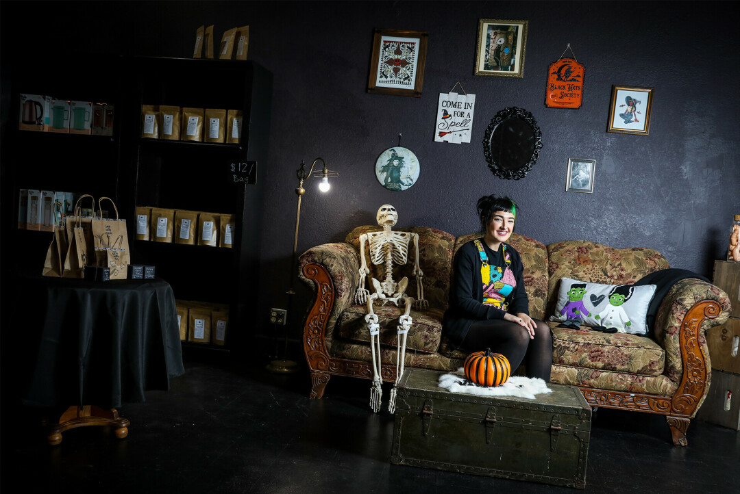 BON-O VER. Brianna is currently letting the public give suggestions for what the shop's mascot, the skeleton on the couch, should be named. One of her favorites so far is Bon-o Ver (like Boni Ver... ha ha). 