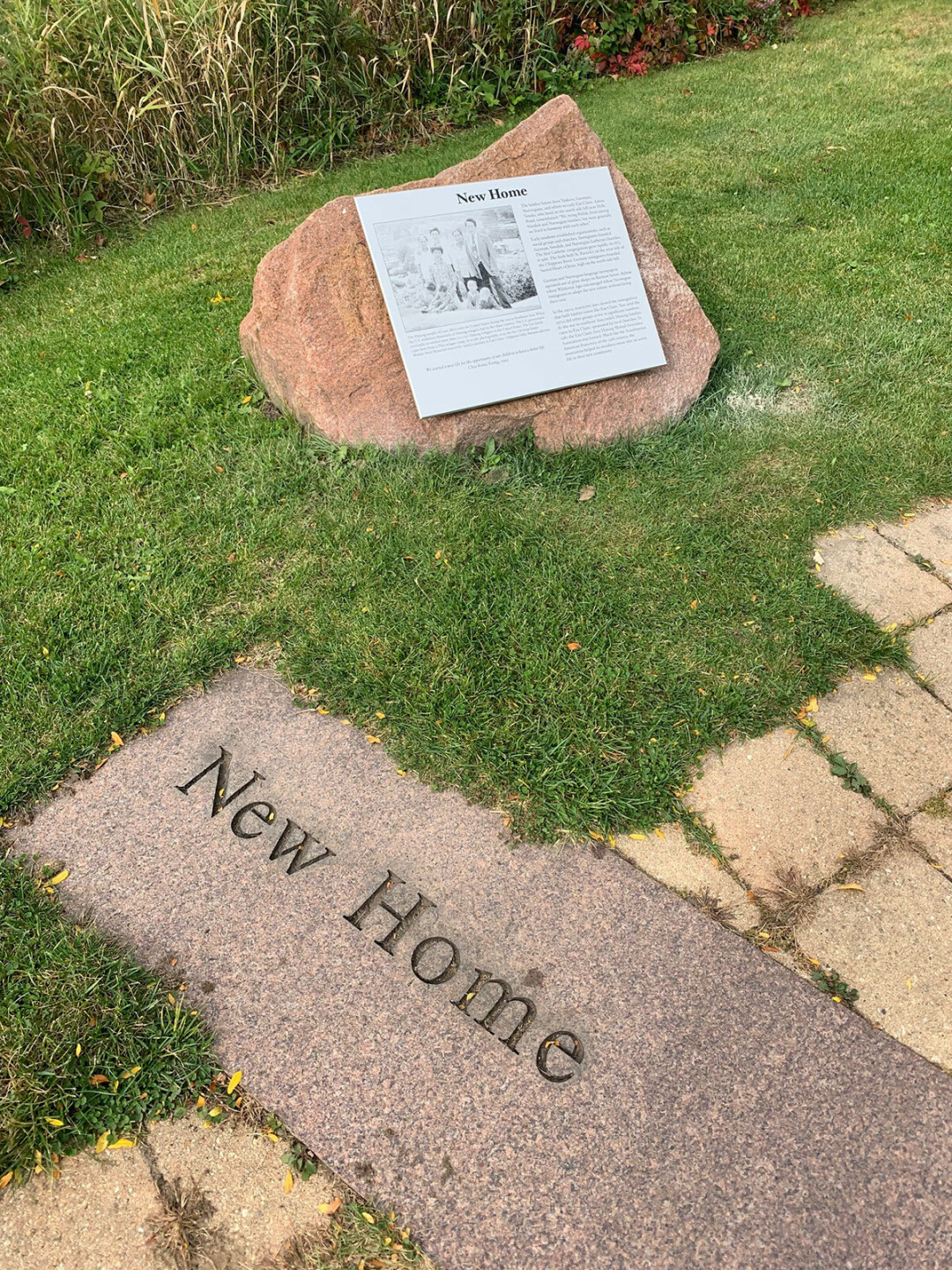 HISTORY ROCKS. The newly installed plaques in Phoenix Park describe aspects of Eau Claire's history – in this case, immigration to the area. (Submitted photo)  