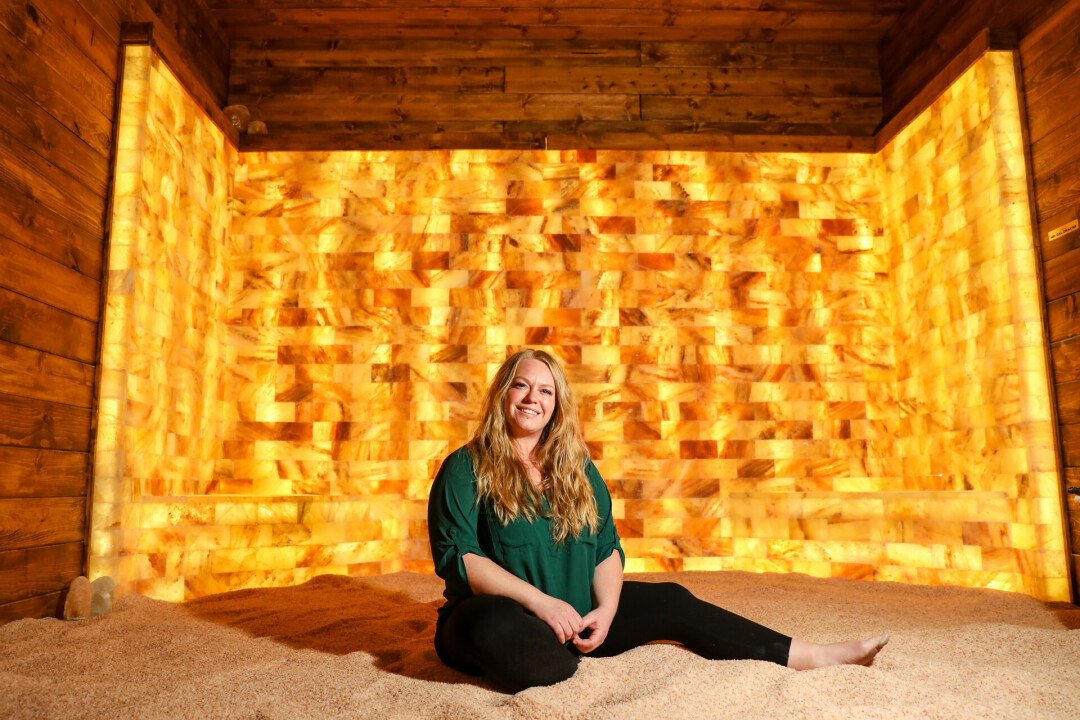 Owner Sarah Steinle sitting in the salt cave.