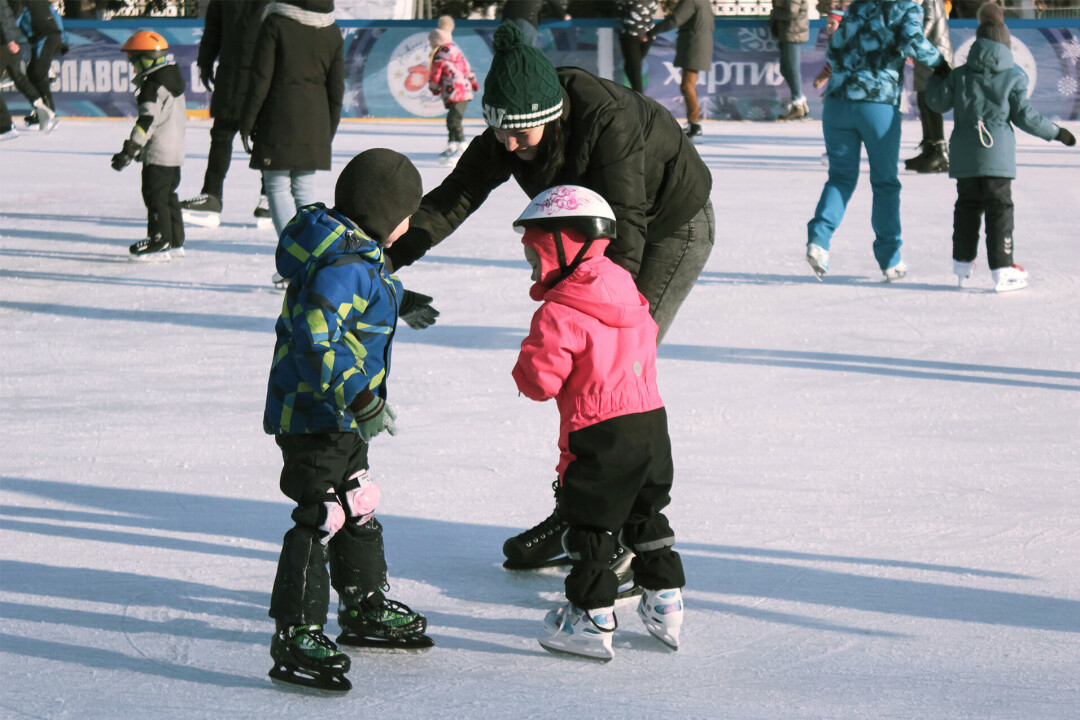 SKATING IN A WINTER WONDERLAND. There is a plethora of winter recreation opportunities in the Chippewa Valley, including in- and outdoor skating. (Photo via Unsplash)