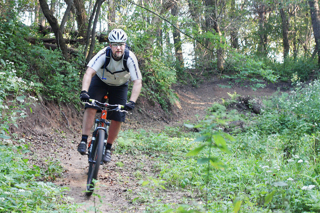 LIVE TO RIDE. CORBA builds and maintains mountain bike trails around the Chippewa Valley, like this one at Lowes Creek County Park. It now hopes to create new trails at the City Well Fields in Eau Claire.