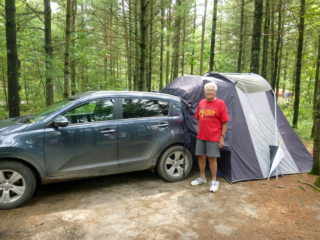 Orrin Rongstad continued to camp into his 80s, using a tent that attached to the back of his car. (Submitted photo)