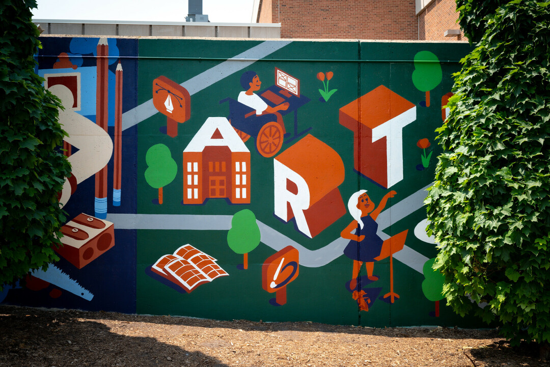 BOLD AND BRIGHT. The new mural on the side of UW-Stout's Applied Arts Building was designed and painted by students. <em>(Photo via Wade Lambrigtsen's Facebook)</em>