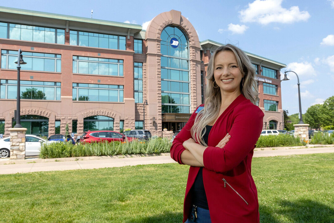 Rachel Christenson outside Royal Credit Union's Corporate Office in downtown Eau Claire.