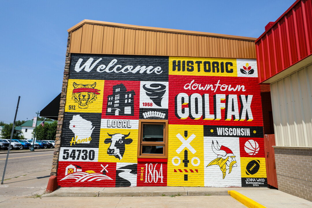 CHANNELING COLFAX. Jenna Wood, owner of Wood Creatives, LLC. created this new mural on the side of The Blind Tiger. (Photo by Andrea Paulseth)