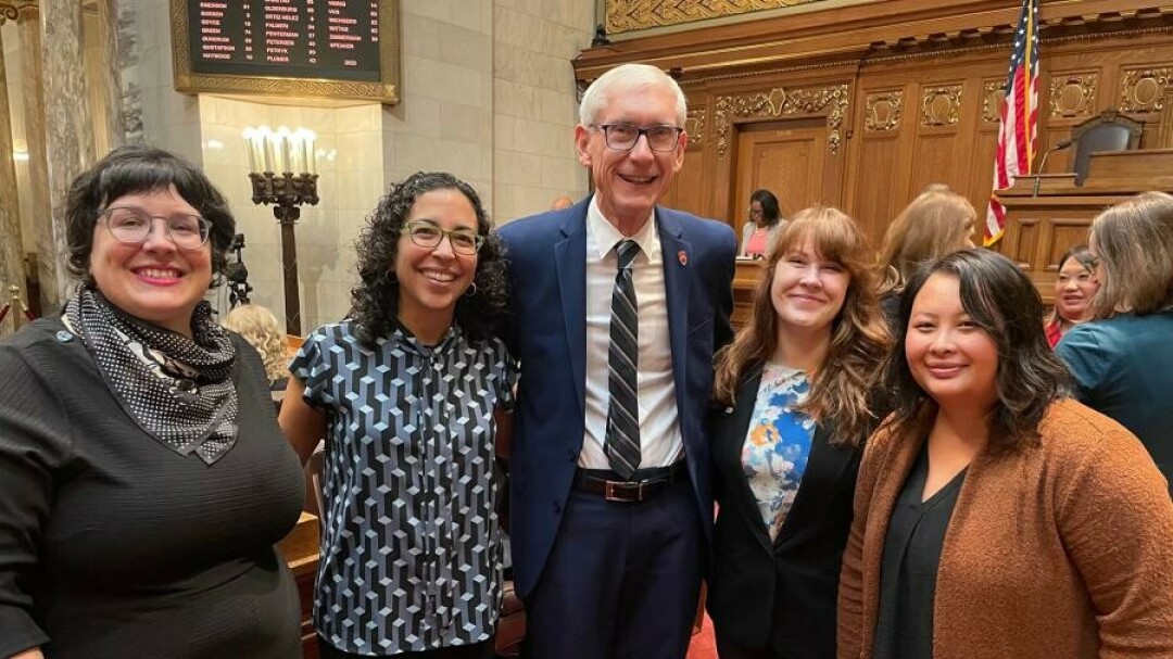 Diversity Awards recipients Alison Lukowski, Glendali Rodriguez and Angie Ruppe with Gov. Tony Evers and UW-Stout Multicultural Student Services Director Mai Khou Xiong.