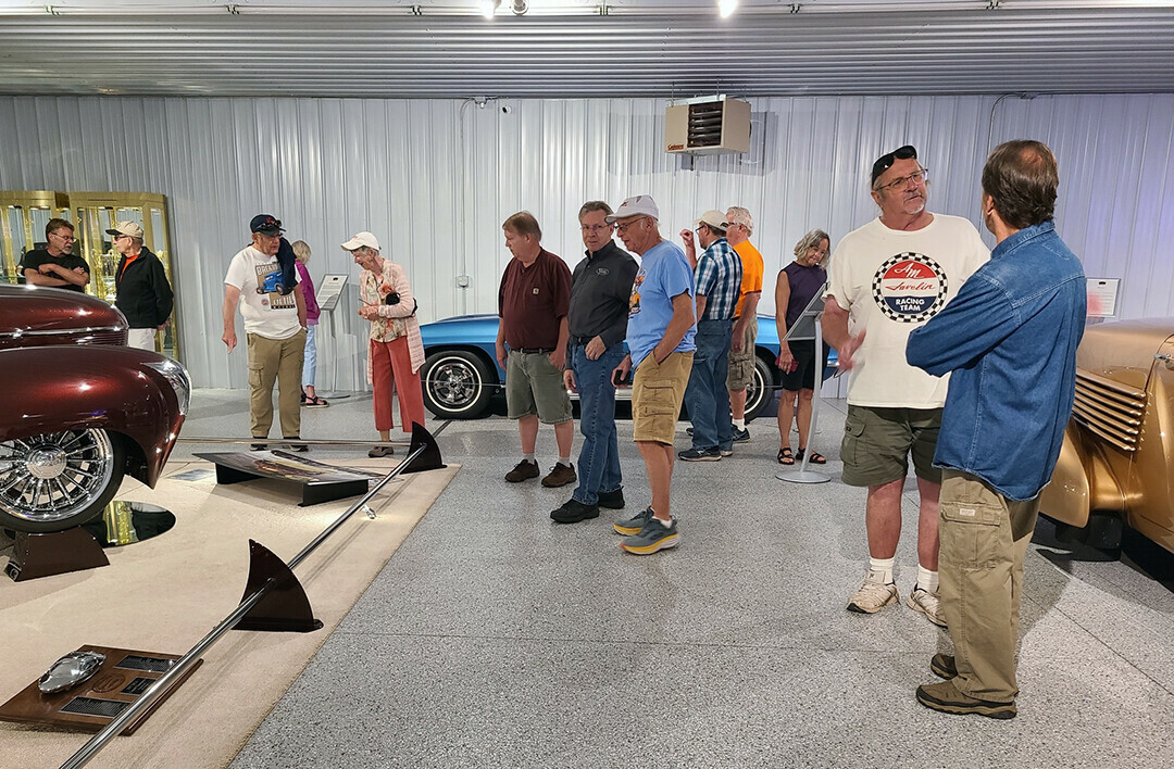 Visitors inside the Graham Motor Museum in Lake Hallie.